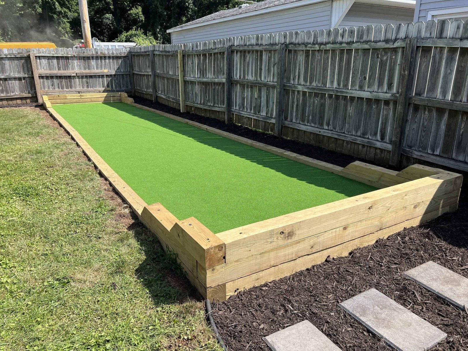 Timber-framed turf court